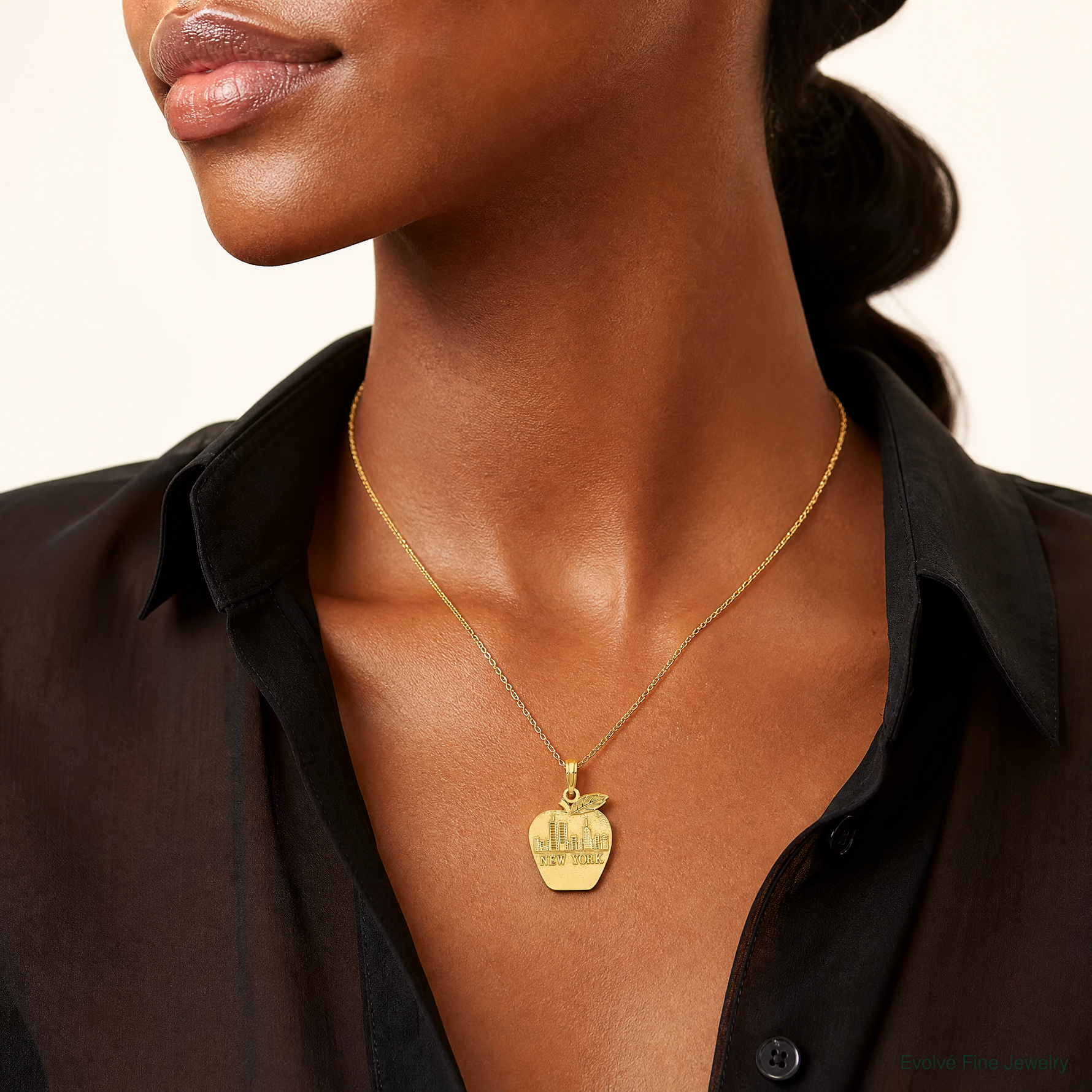 14k Solid NEW YORK Skyline on Small Apple Pendant - Model Shot