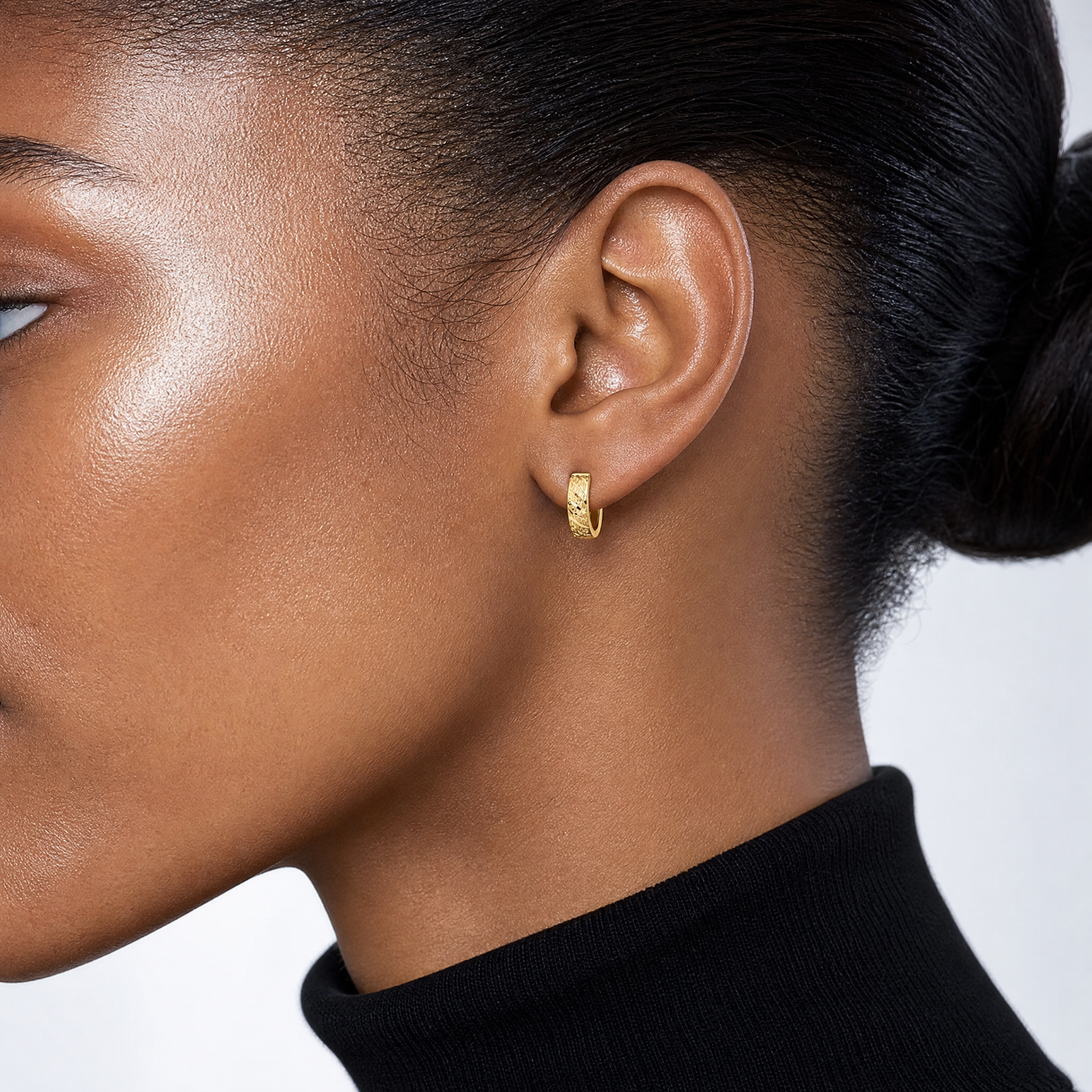 Leslie's 14K Polished and Diamond-cut Huggie Hoop Earrings - Model Shot