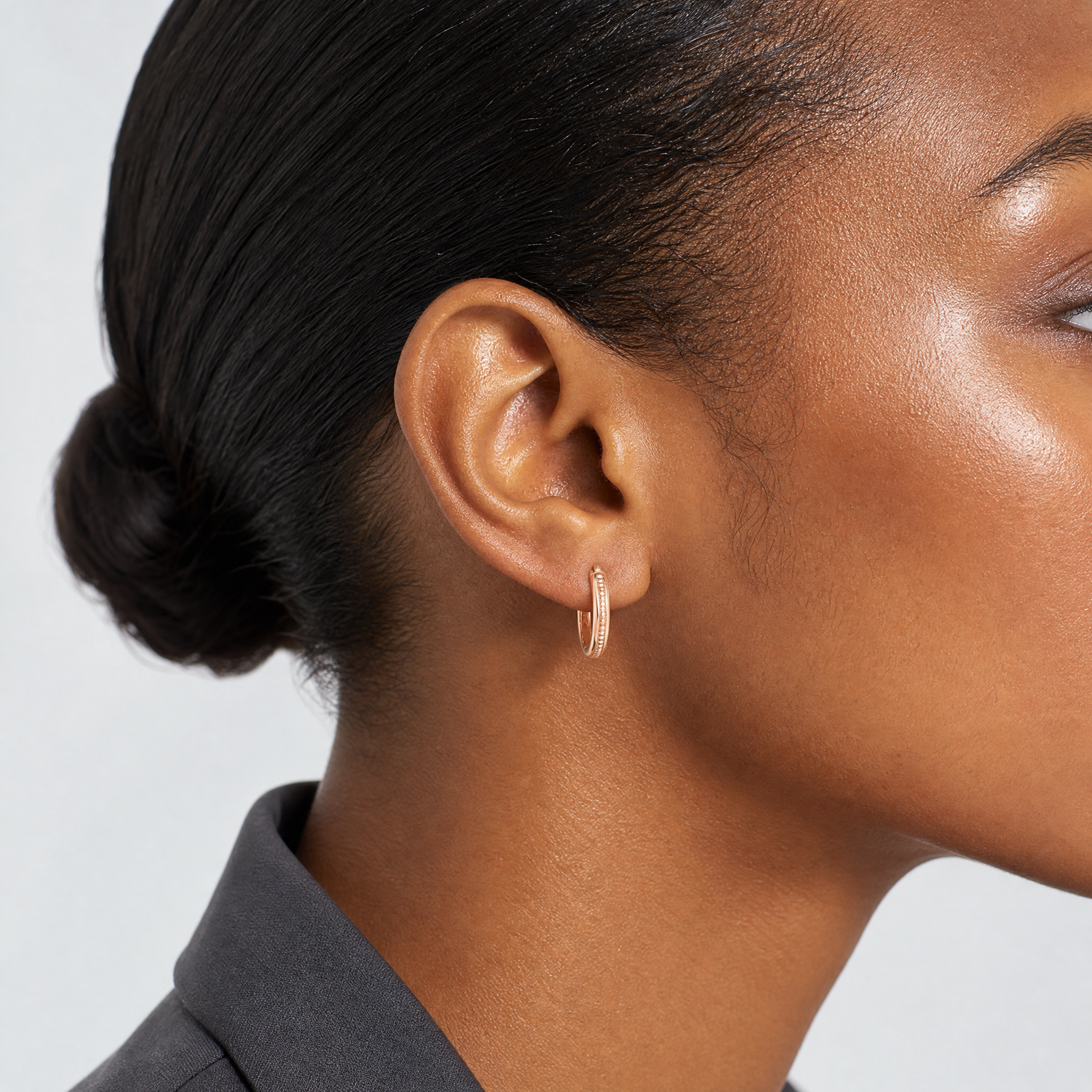 Leslie's 14K Rose Gold Polished and Textured Huggie Hoop Earrings - Model Shot