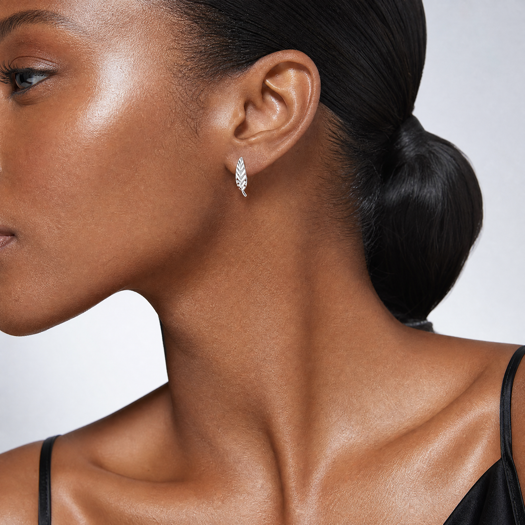 Leslie's 14K White Gold Polished and Diamond-cut Leaf Post Earrings - Model Shot