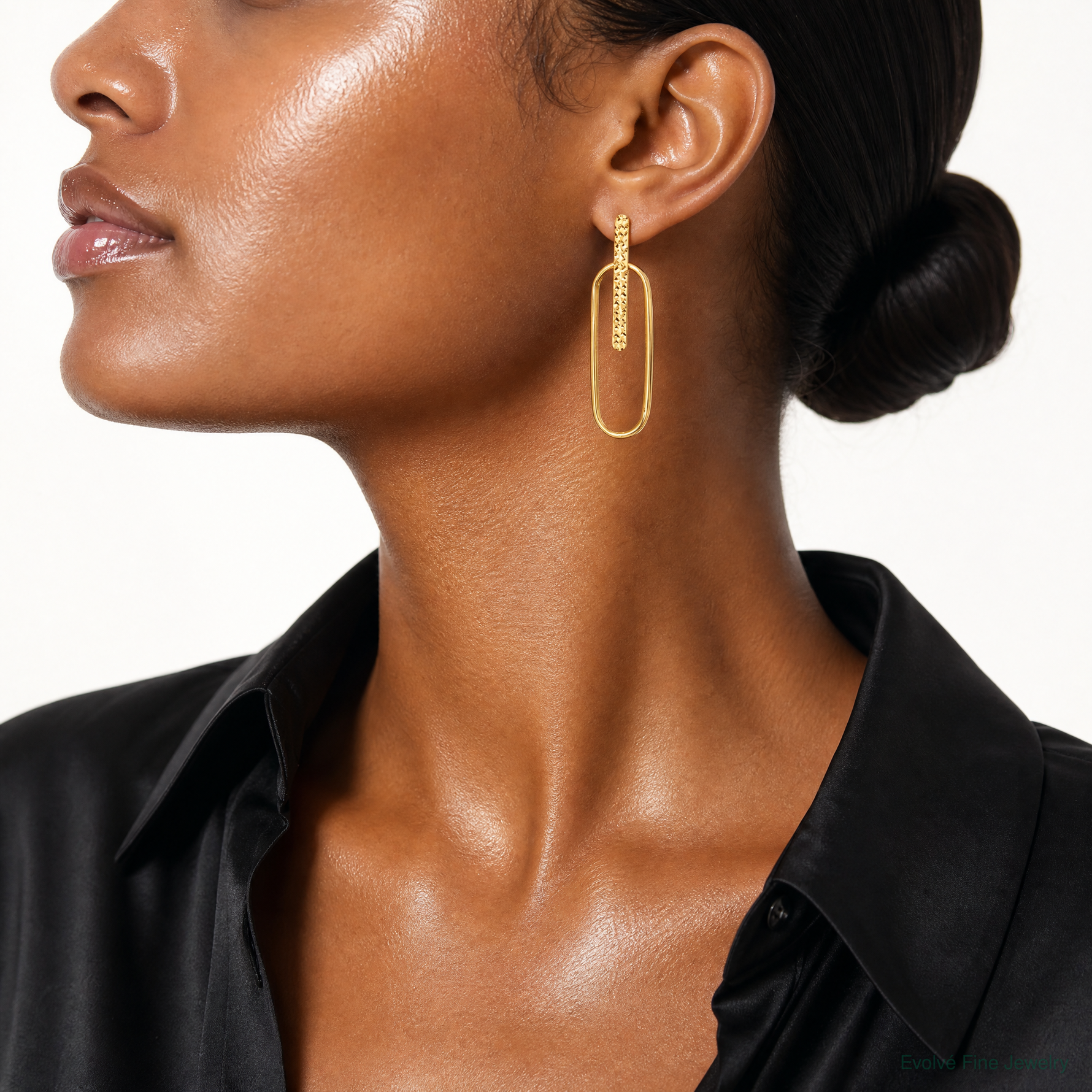 Leslie's 14K Polished and Diamond-cut Oval Dangle Post Earrings - Model Shot