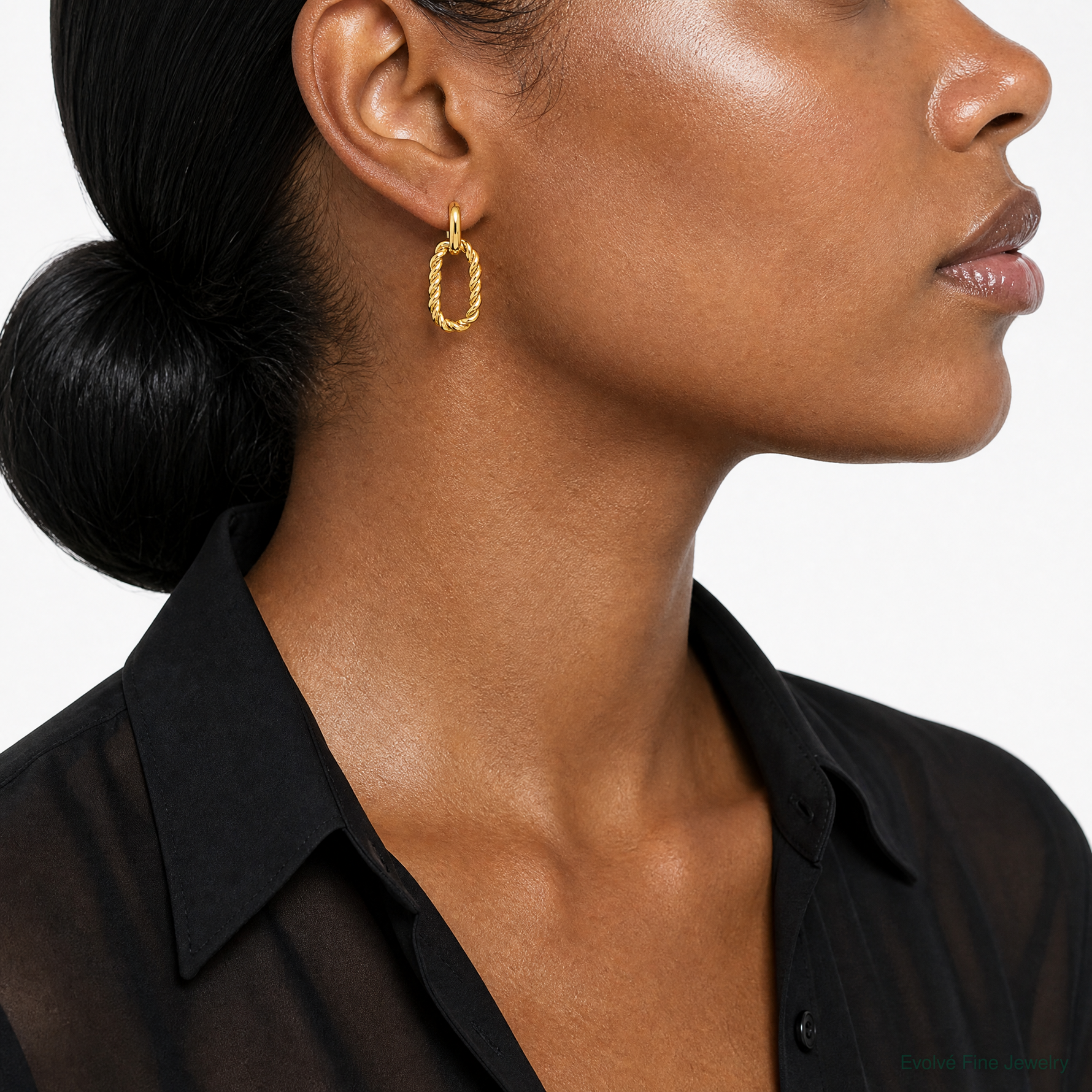 Leslie's 14K Polished and Twisted Oval Link Dangle Post Earrings - Model Shot