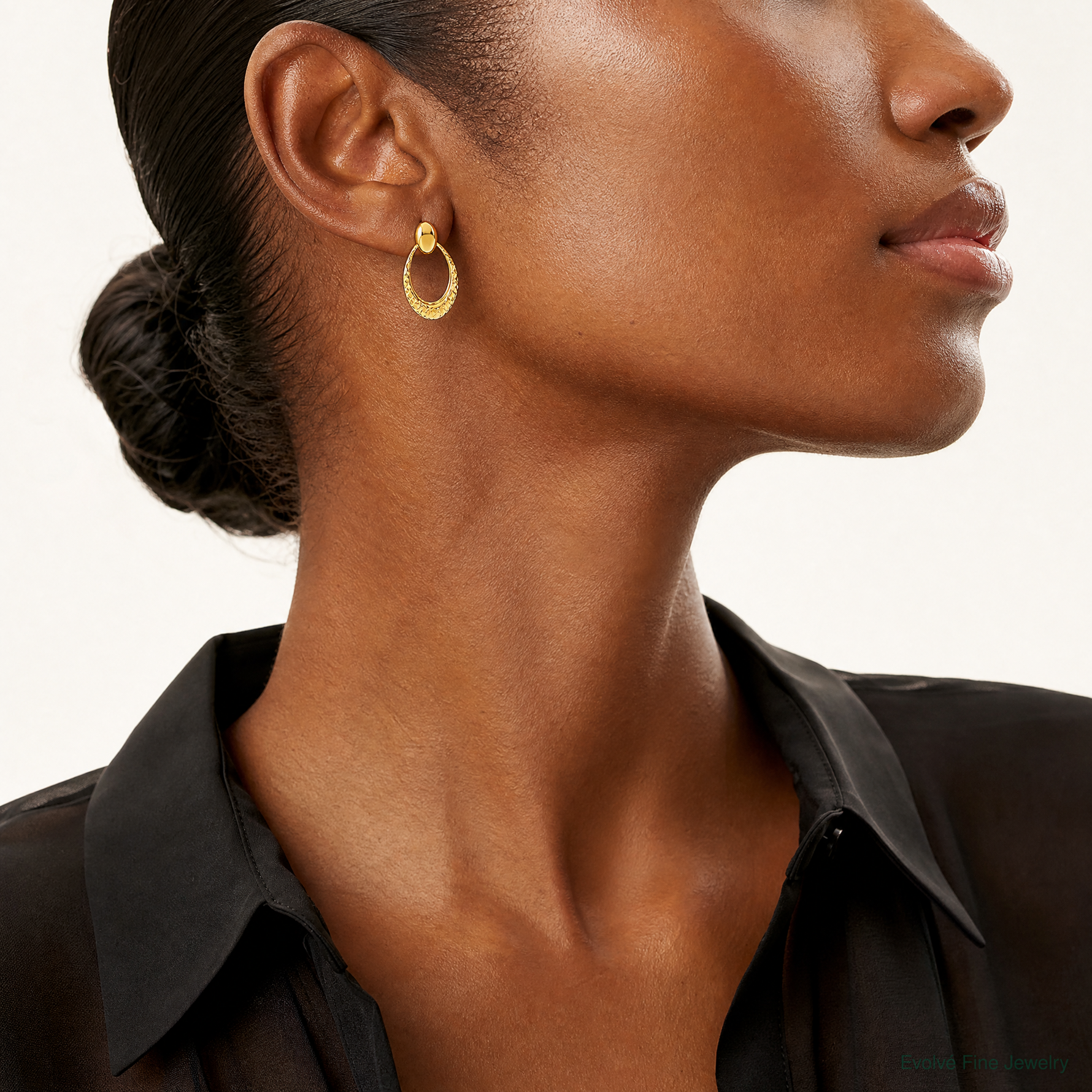 Leslie's 14K Polished and Diamond-cut Oval Dangle Post Earrings - Model Shot