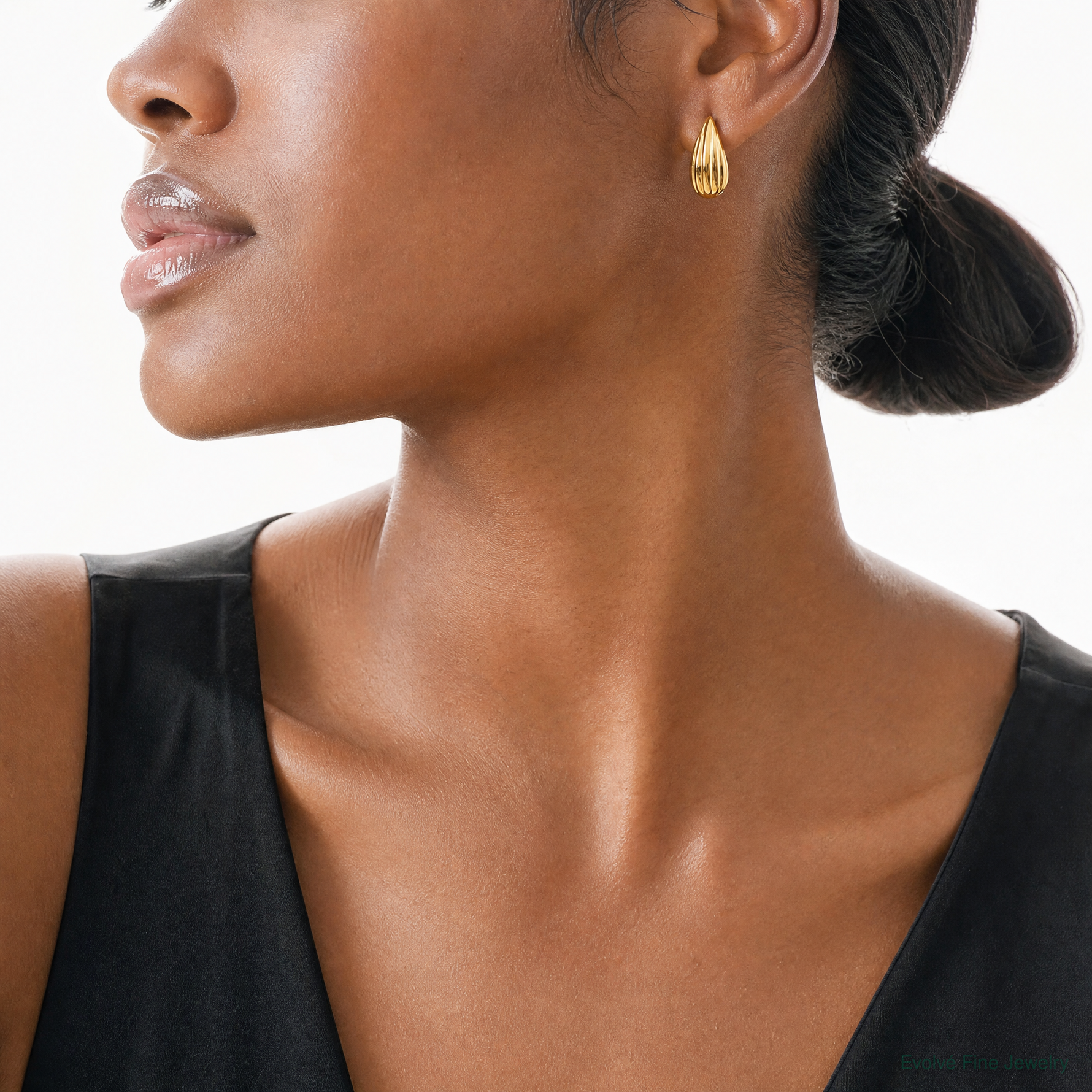 Leslie's 14K Polished Grooved Omega Back Earrings - Model Shot