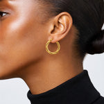 Leslie's 14K Polished Grooved and Twisted Hoop Earrings - Model Shot