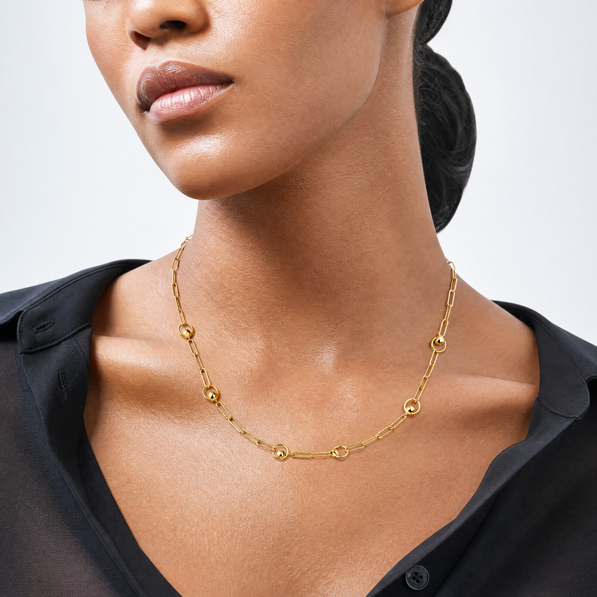 Leslie's 14K Polished and Dia-cut. Circle Station Paperclip Necklace - Model Shot