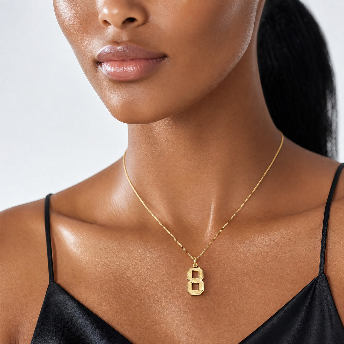 14k Medium Satin Number 8 Charm - Model Shot