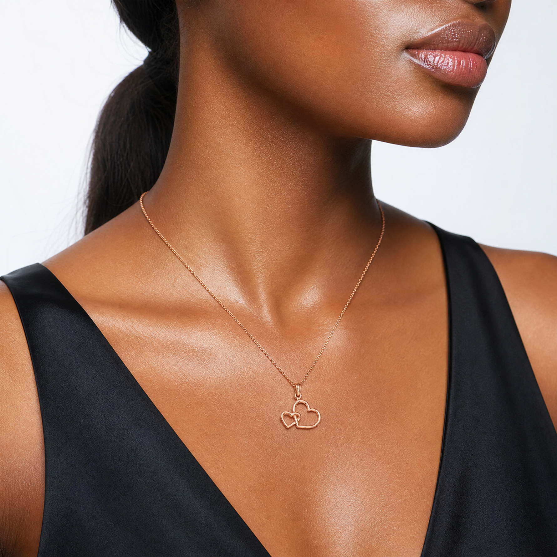 14K Rose Polished Intertwined Double Heart Pendant - Model Shot