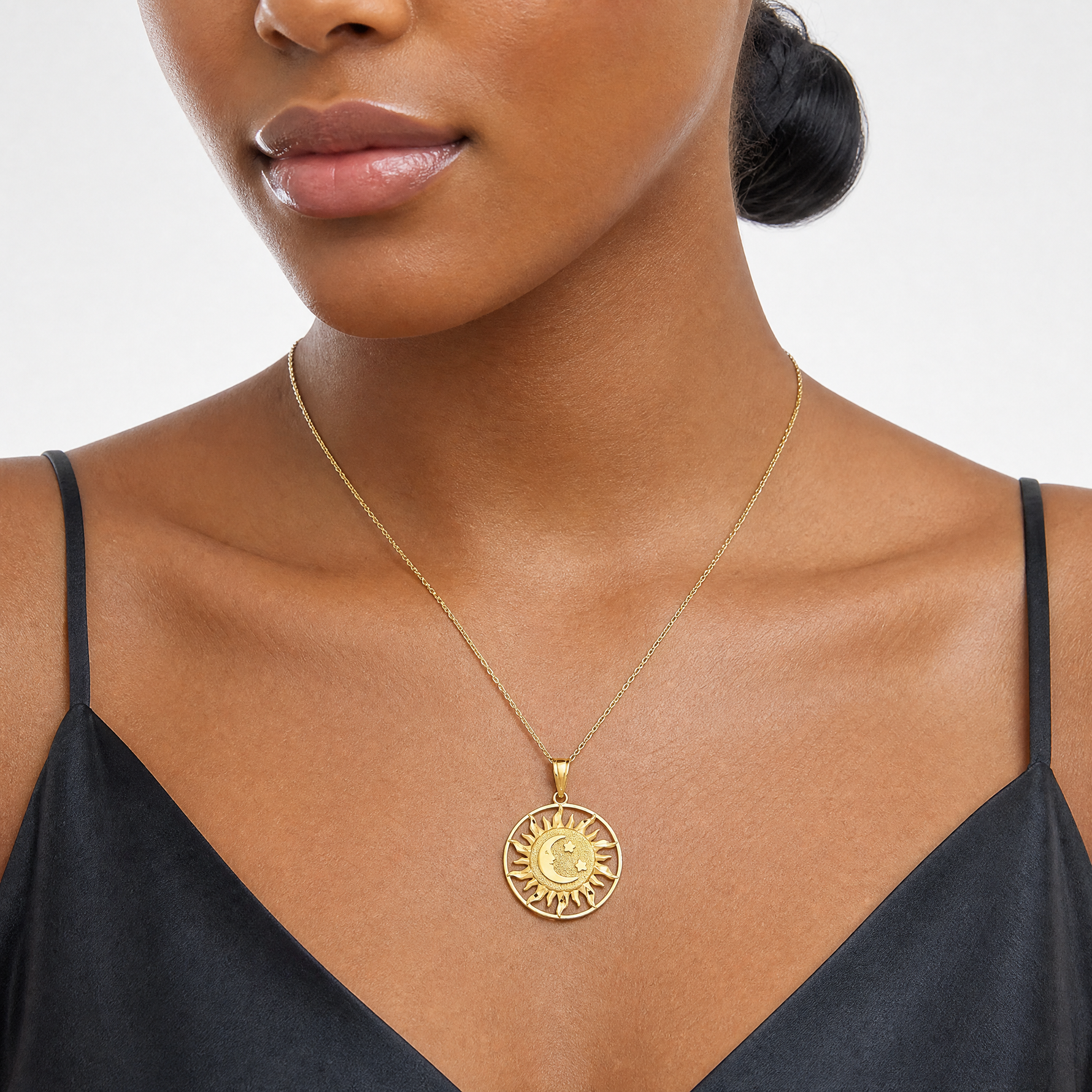 14k Diamond-cut Sun with Moon and Stars Charm - Model Shot
