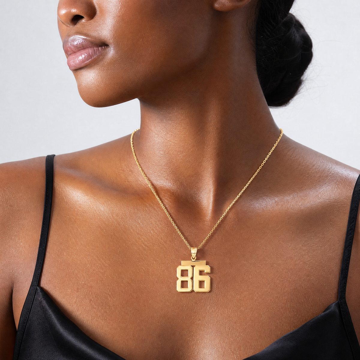 14k Medium Polished Number 86 Charm - Model Shot