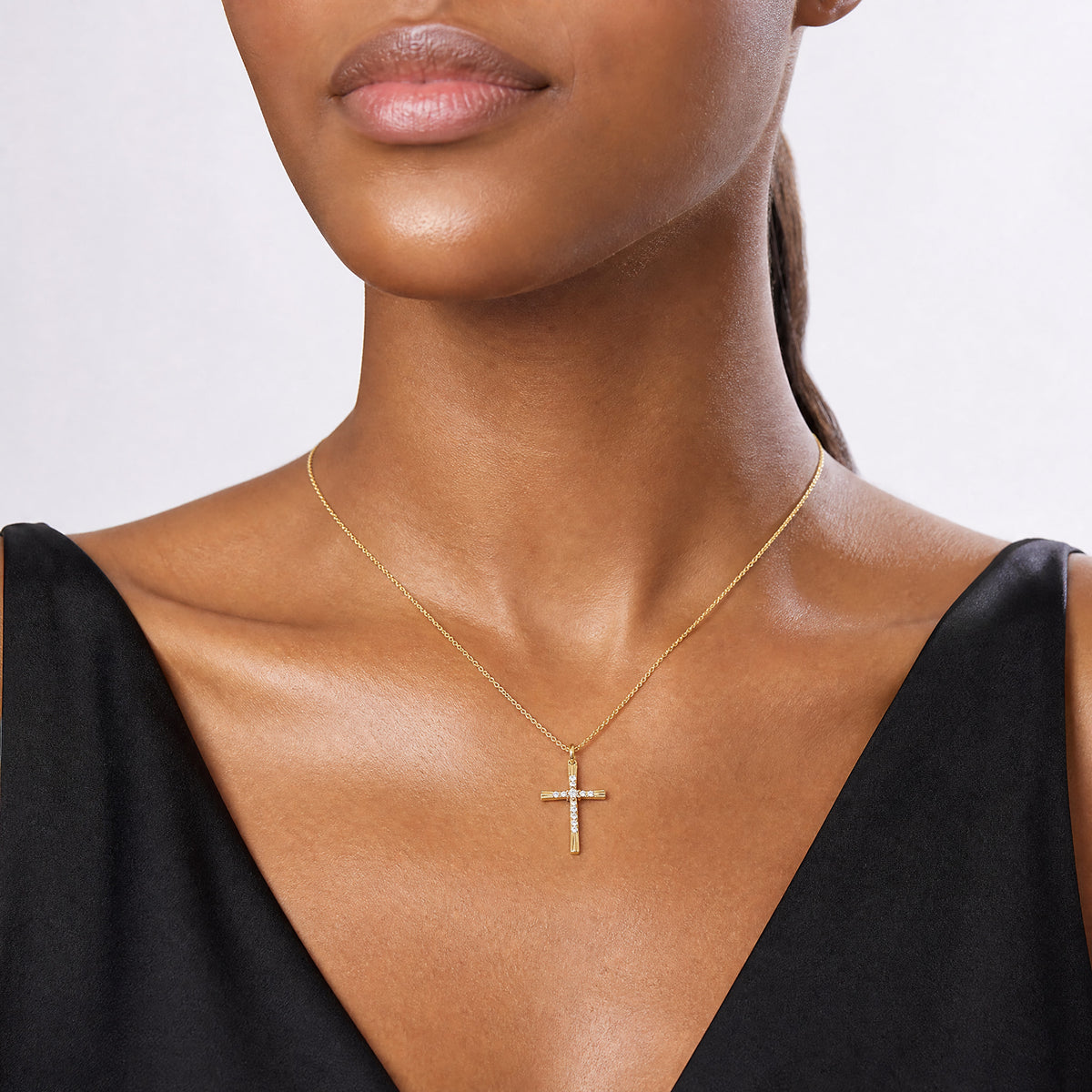 14k 1/10ct. Diamond Cross Pendant - Model Shot