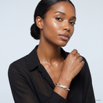 Sterling Silver Infinity w/Feather Bangle Bracelet - Model Shot