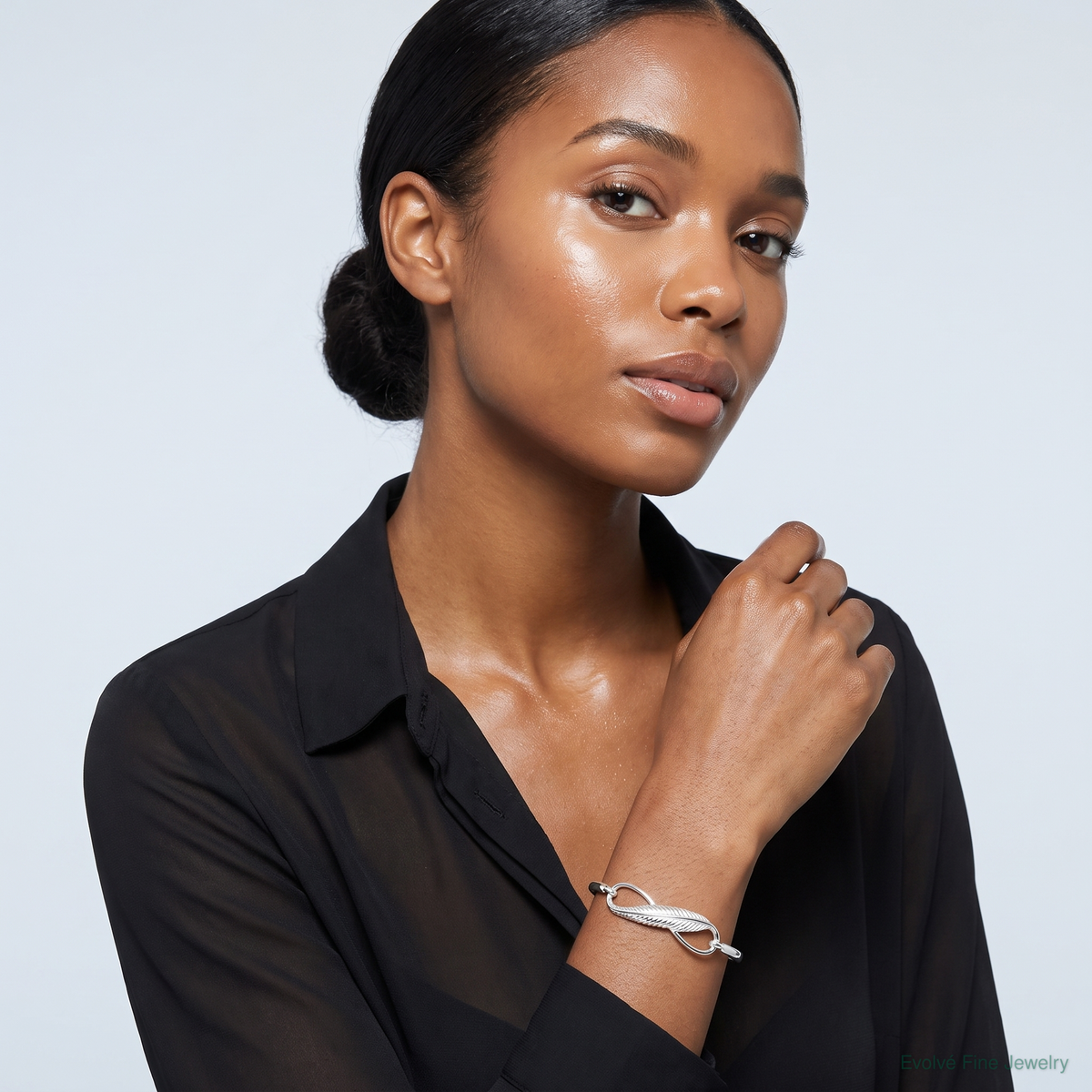 Sterling Silver Infinity w/Feather Bangle Bracelet - Model Shot