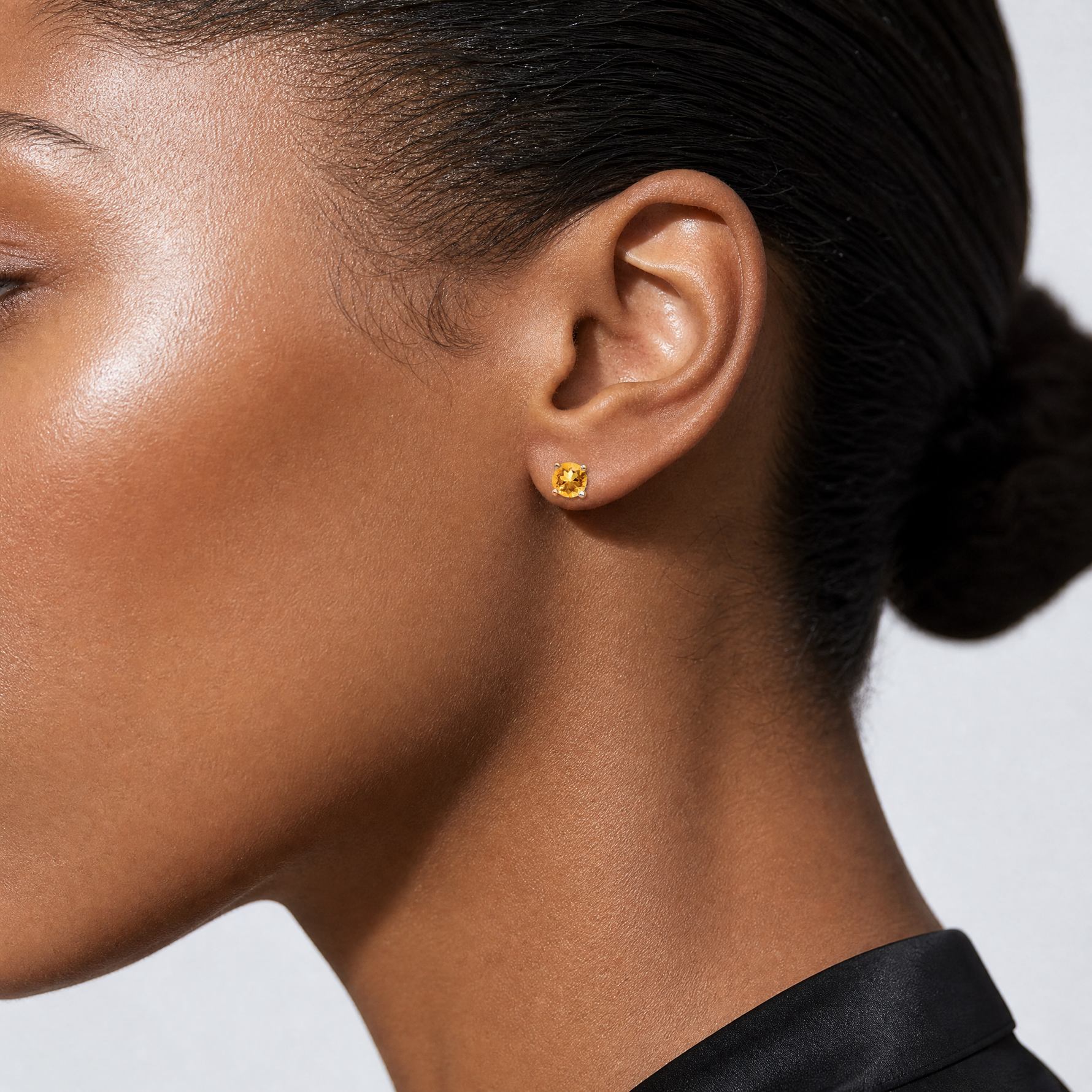 Sterling Silver Rhodium-plated 4mm Round Citrine Post Earrings - Model Shot