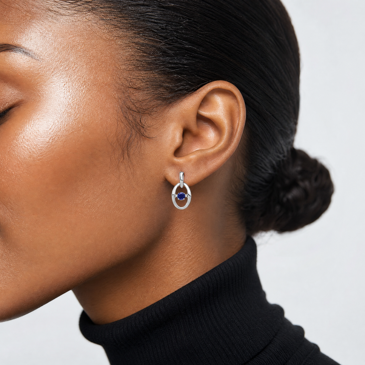 Sterling Silver Rhodium Created Blue Sapphire Birthstone Vibrant Earrings - Model Shot