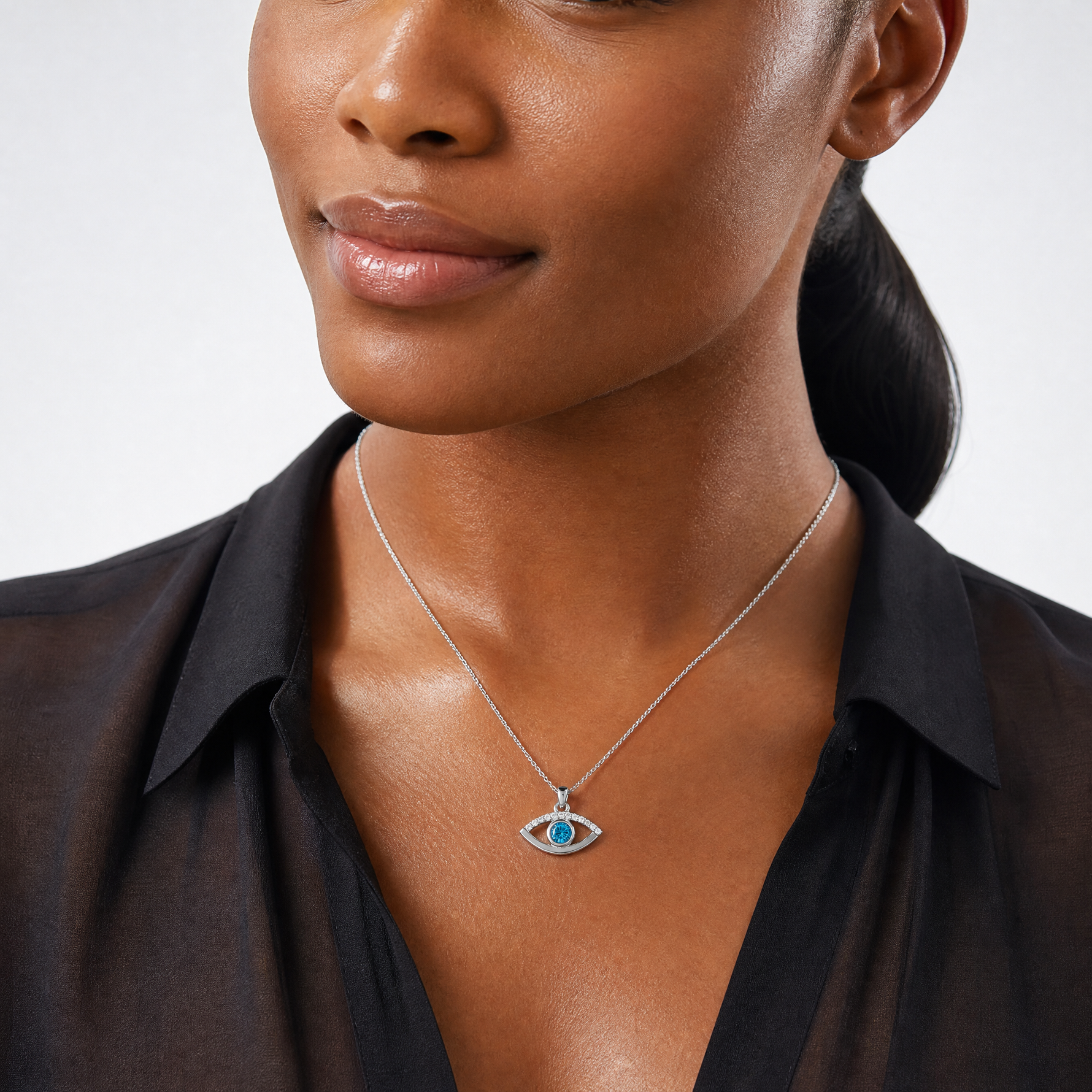 Sterling Silver Rhodium-plated Blue Zircon and CZ Evil Eye Pendant - Model Shot