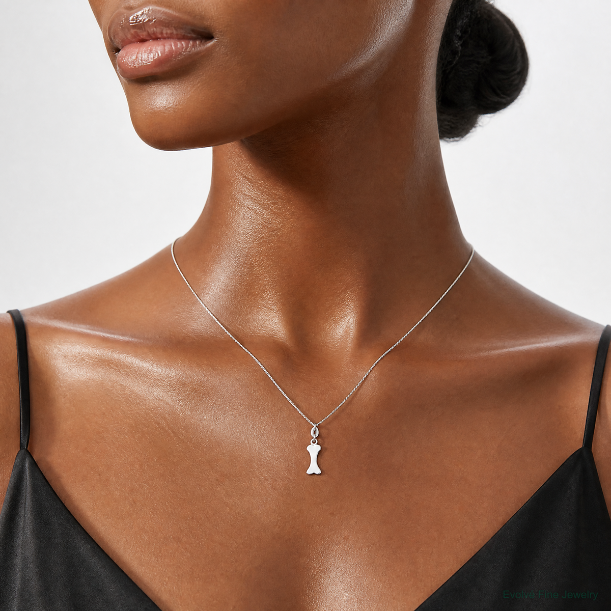 Sterling Silver Polished Dog Bone Charm - Model Shot