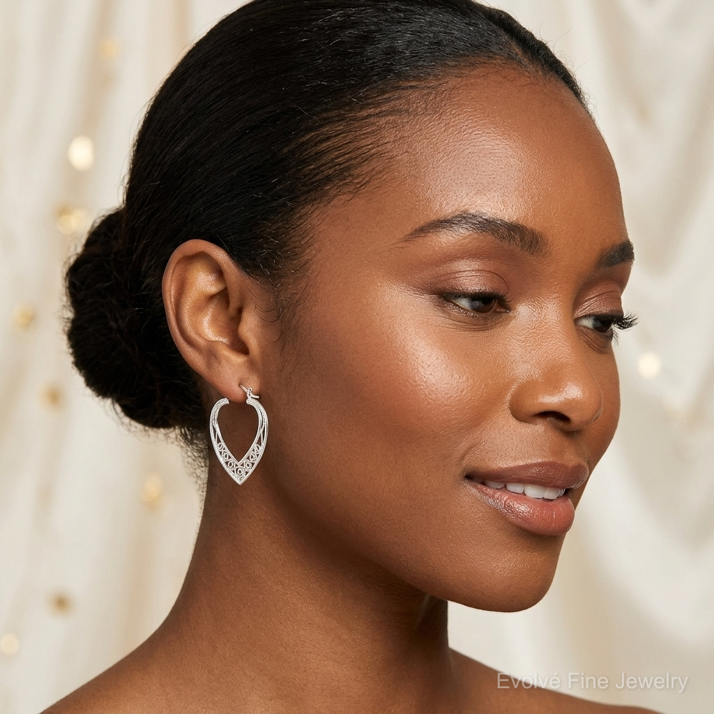 Sterling Silver Polished Filigree Heart Hoop Earrings - Model Shot