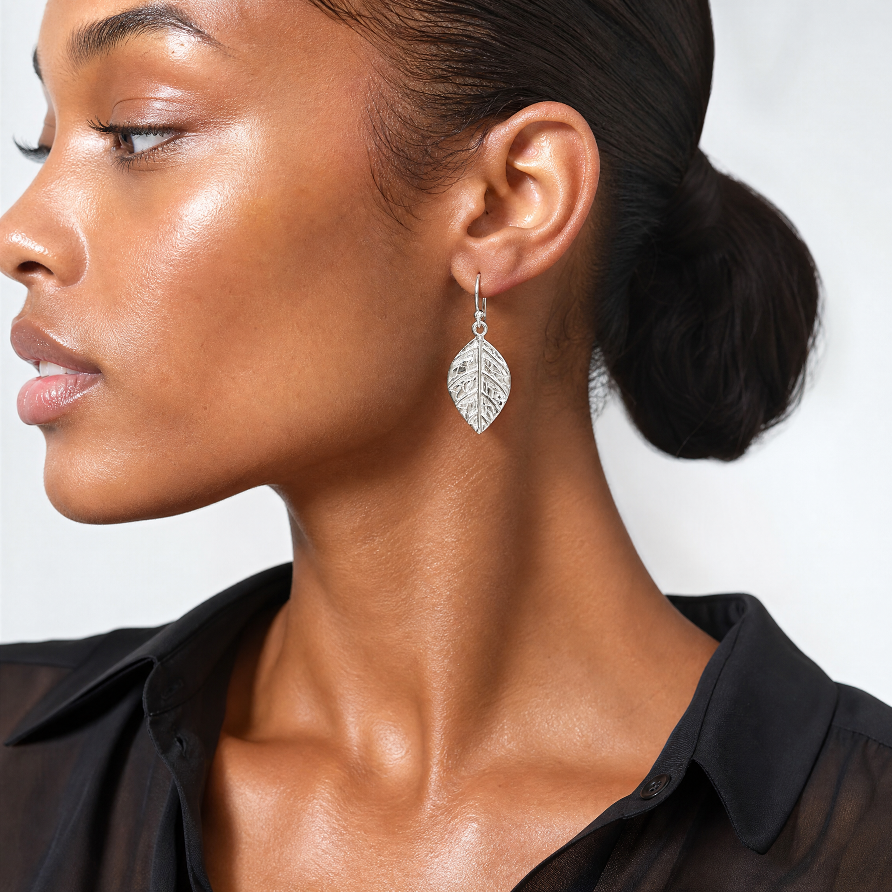 Sterling Silver Leaf Textured Dangle Earrings - Model Shot