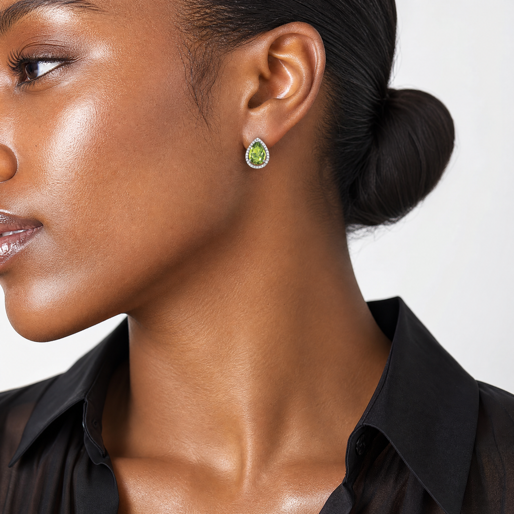 Sterling Silver Rhodium Polished Simulated Peridot & CZ Post Earrings - Model Shot