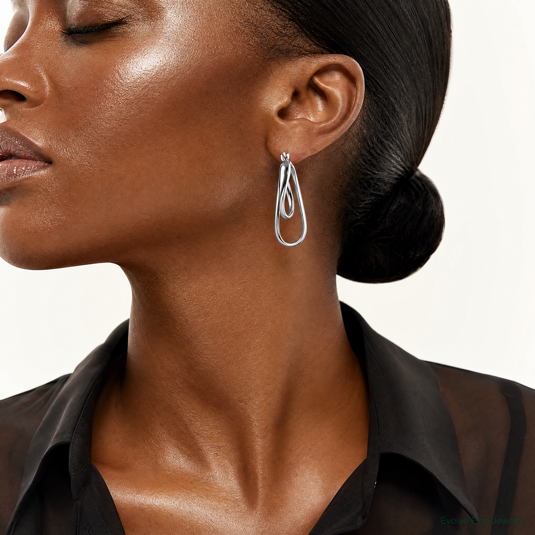 Sterling Silver Rhodium-plated Twisted Double Oval Hoop Earrings - Model Shot