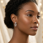 Sterling Silver Rhodium-plated CZ Twisted Oval Hoop Earrings - Model Shot