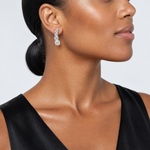 Sterling Silver Rhodium-plated Polished Graduated CZ Post Earrings - Model Shot