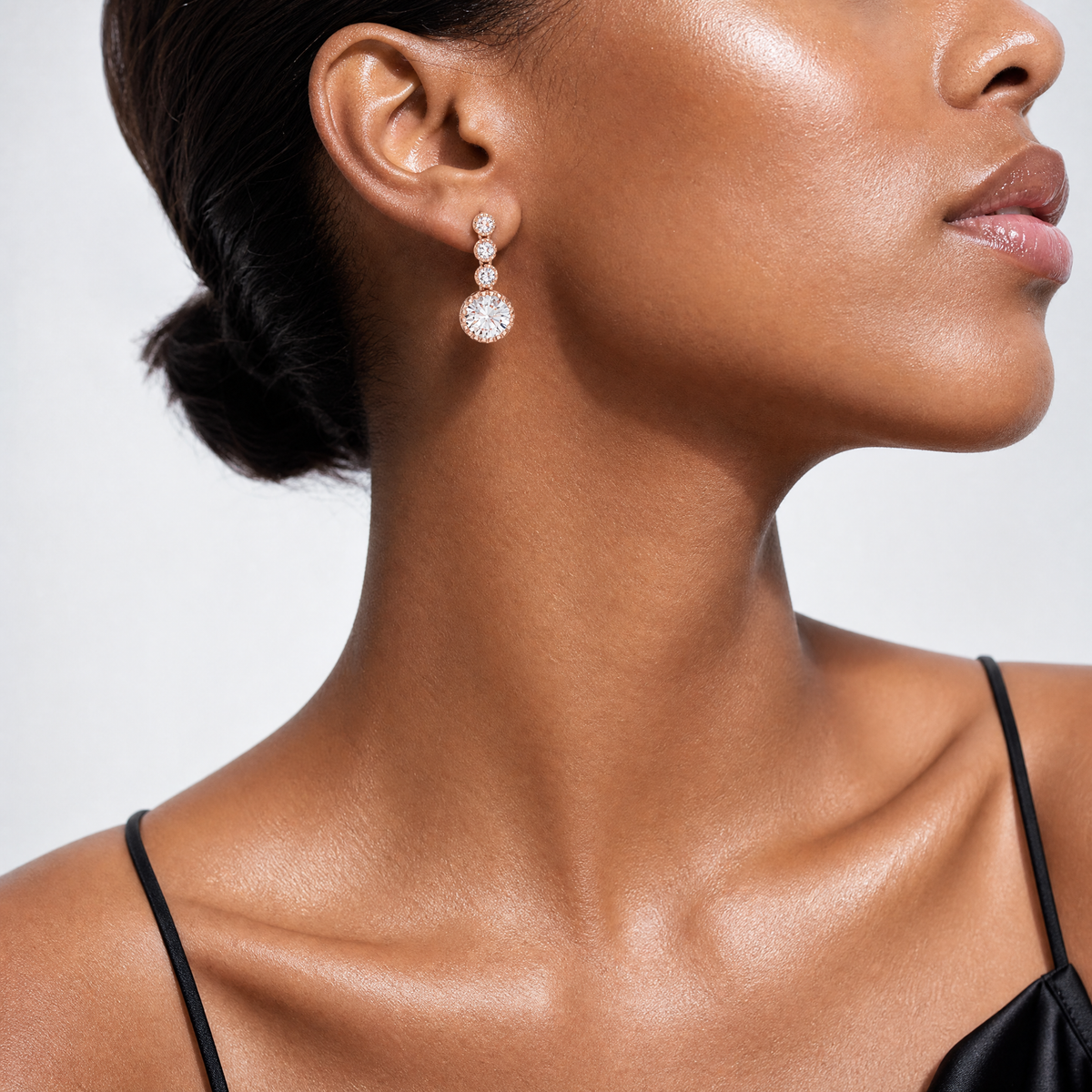 Sterling Silver Rose-tone Polished Round CZ Post Dangle Earrings - Model Shot