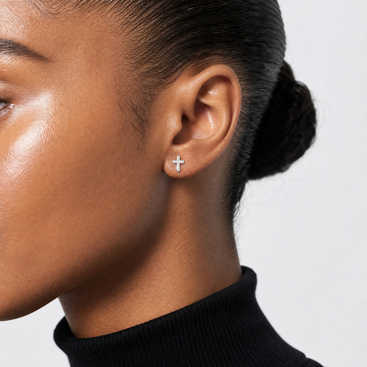 Sterling Silver Polished Latin Cross Petite Post Earrings - Model Shot