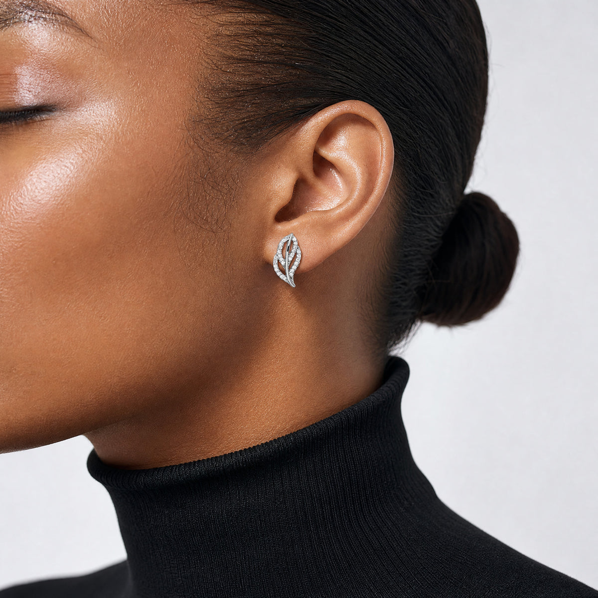 Sterling Silver Rhodium-plated Polished CZ Leaf Post Earrings - Model Shot