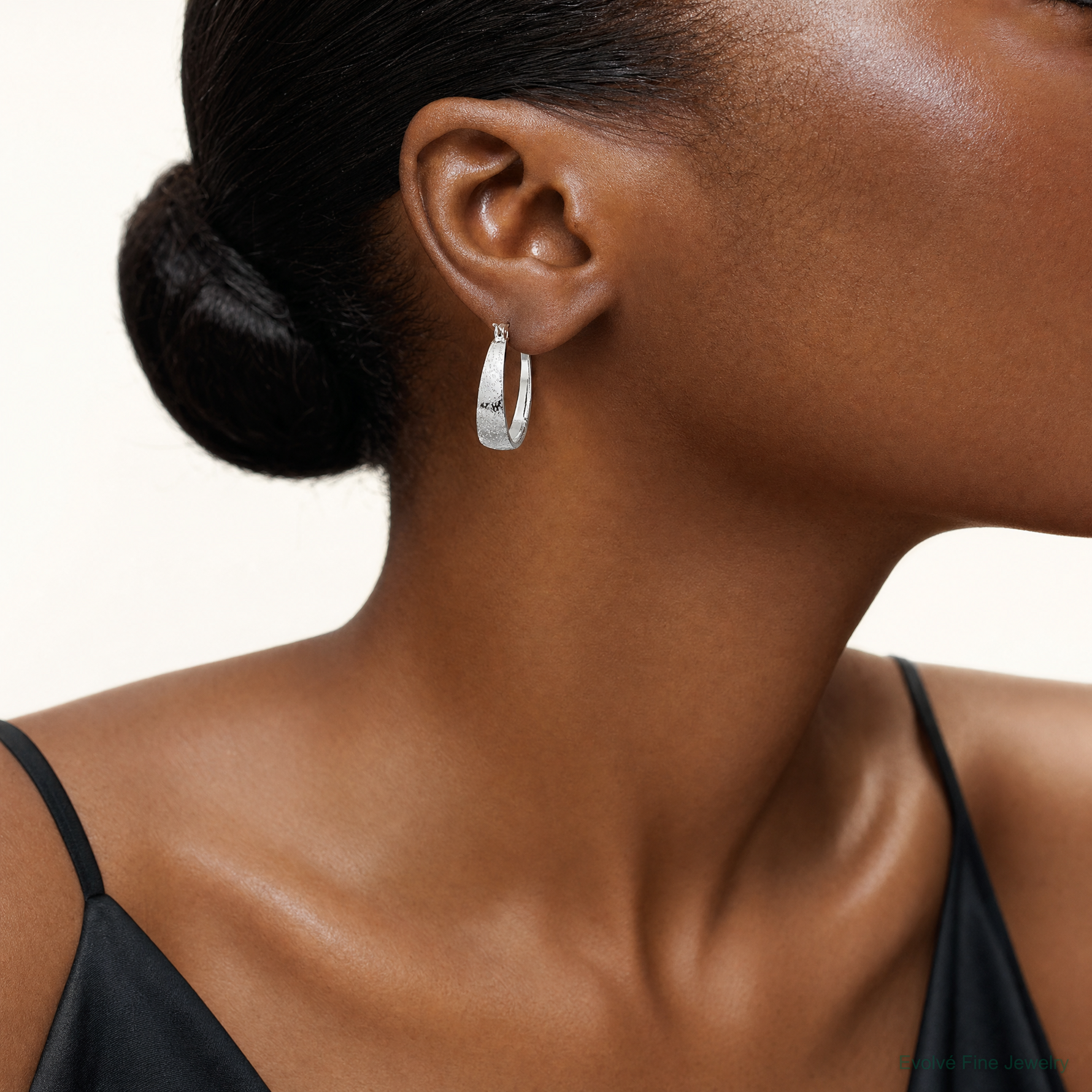 Sterling Silver RH-plated Sparkle Texture Tapered Round Hoop Earrings - Model Shot
