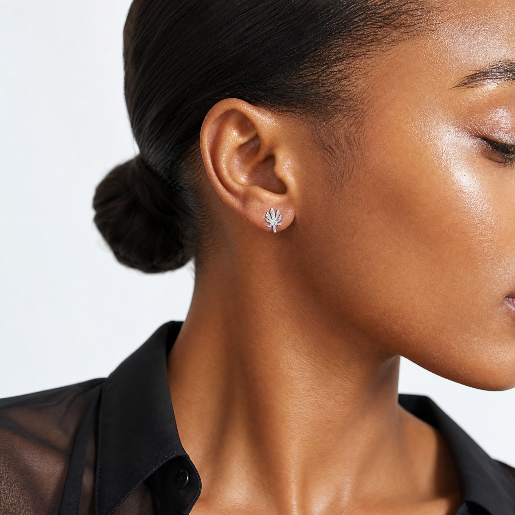 Sterling Silver Rhodium-plated Textured Leaf Post Earrings - Model Shot