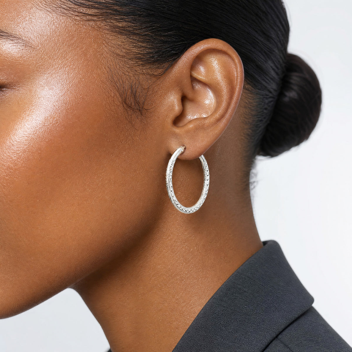Sterling Silver Laser/Dia-cut 30x3.25mm Hidden Catch Round Hoop Earrings - Model Shot