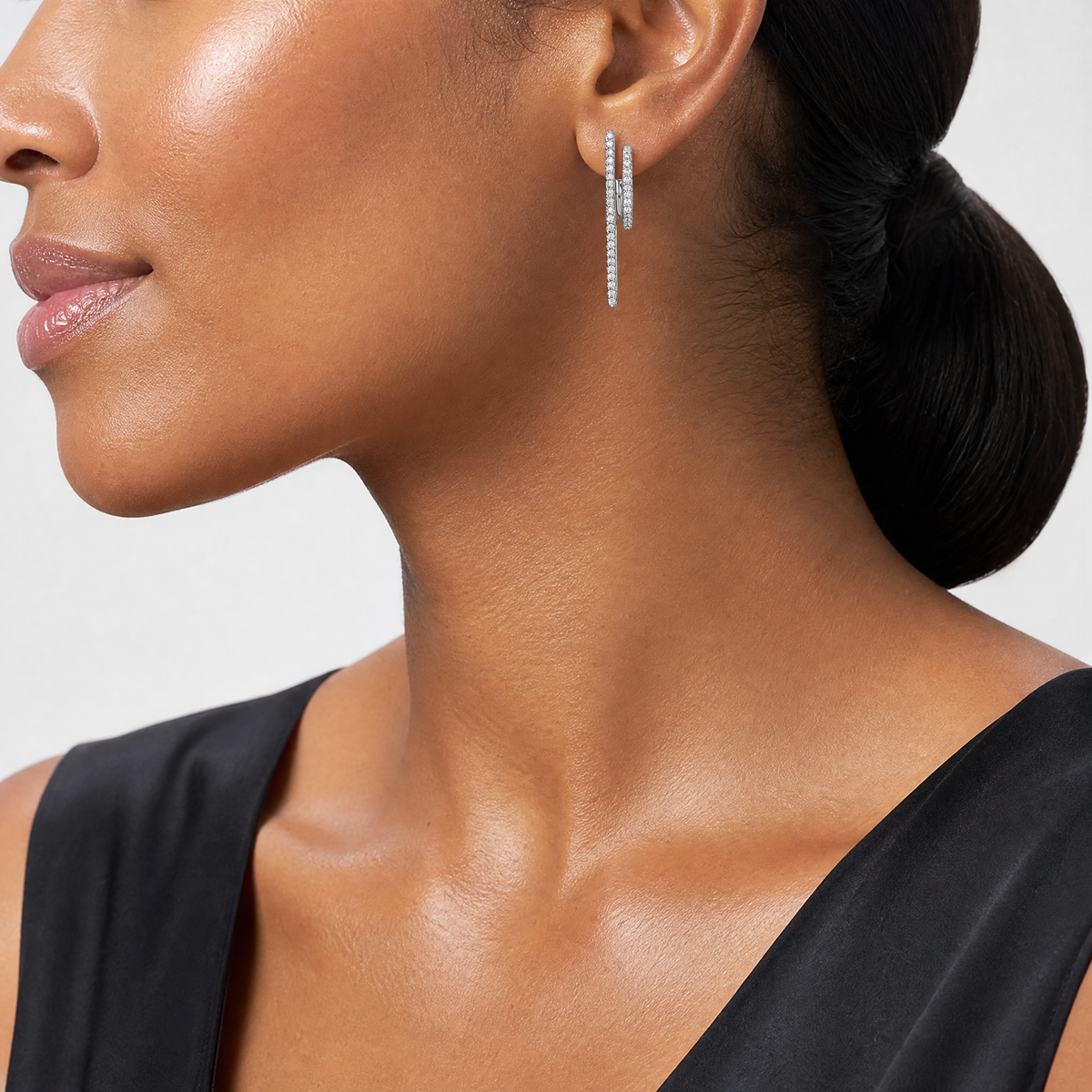 Sterling Silver Rhodium-plated CZ Front and Back Dangle Post Earrings - Model Shot