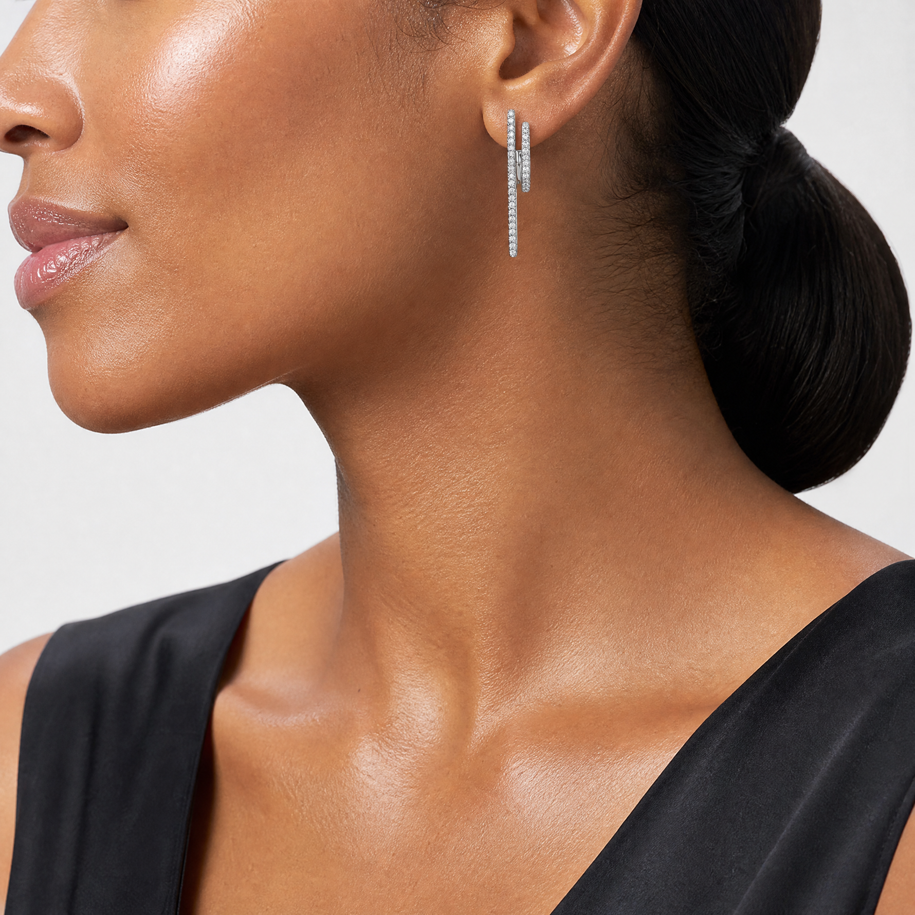 Sterling Silver Rhodium-plated CZ Front and Back Dangle Post Earrings - Model Shot