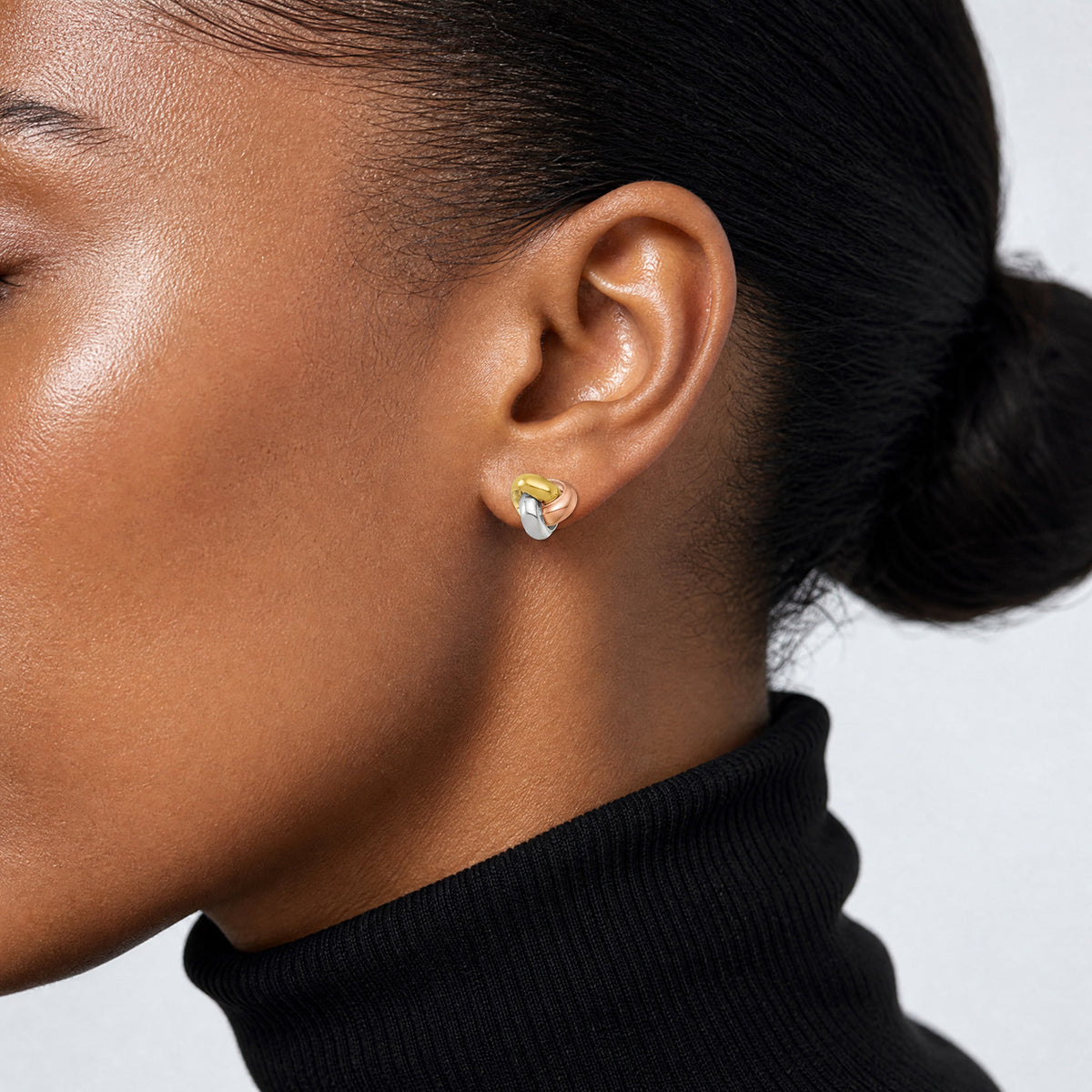 Sterling Silver Rose and Gold-tone Polished Love Knot Post Earrings - Model Shot