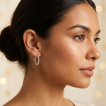 Sterling Silver Rhodium-plated 1.5mm Oval Omega Back Hoop Earrings - Model Shot