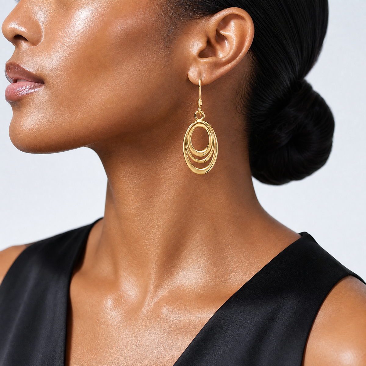 Sterling Silver Flash Gold-plated Polished Triple Oval Dangle Earrings - Model Shot