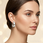 Sterling Silver Rhod-pltd Polish 10mm Omega Back Oval Hoop Earrings - Model Shot