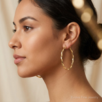 Sterling Silver Gold-plated Twisted 4mm Oval Hoop Earrings - Model Shot
