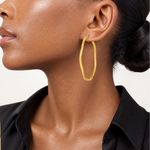 Sterling Silver Gold-plated Diamond Cut 2mm Wavy Hoop Earrings - Model Shot