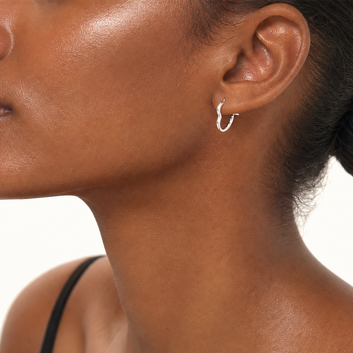 Sterling Silver Rhodium Plated Hollow Heart Hoop Earrings - Model Shot