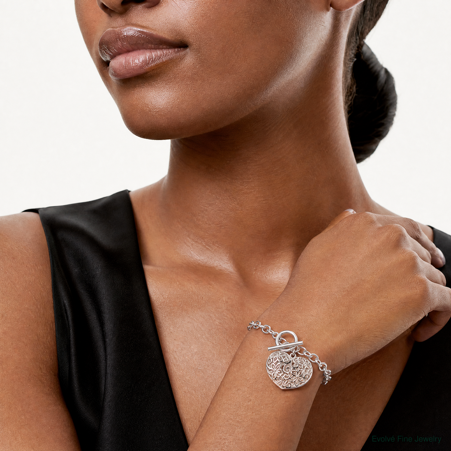 Sterling Silver Puffed Filigree Heart Toggle Bracelet - Model Shot