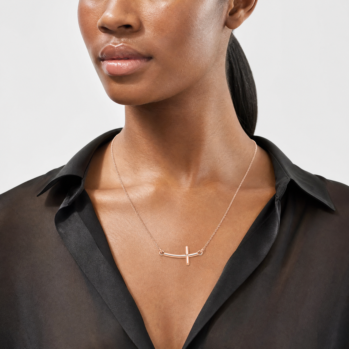 Sterling Silver RG-plated Small Sideways Curved Cross Necklace - Model Shot