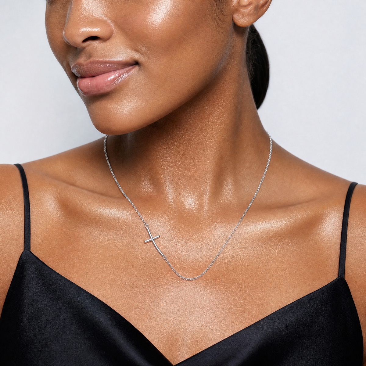 Sterling Silver Rh-plated Small Off-Set Sideways Curved Cross Necklace - Model Shot