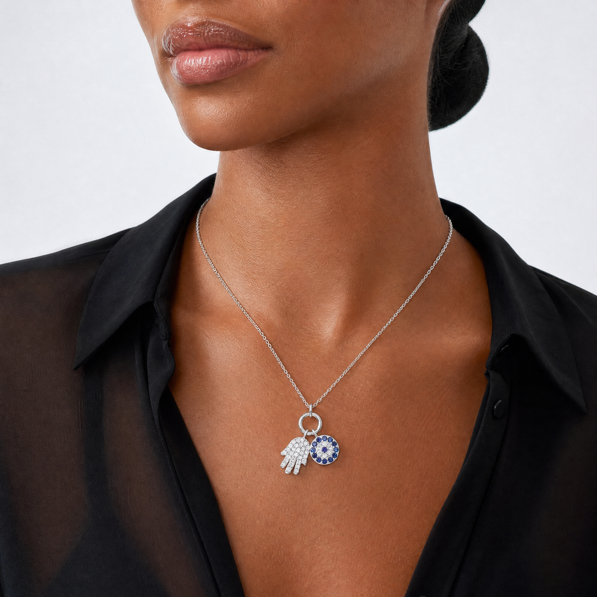 Sterling Silver Rhod-plated CZ Eye and Hamsa Charm Necklace - Model Shot