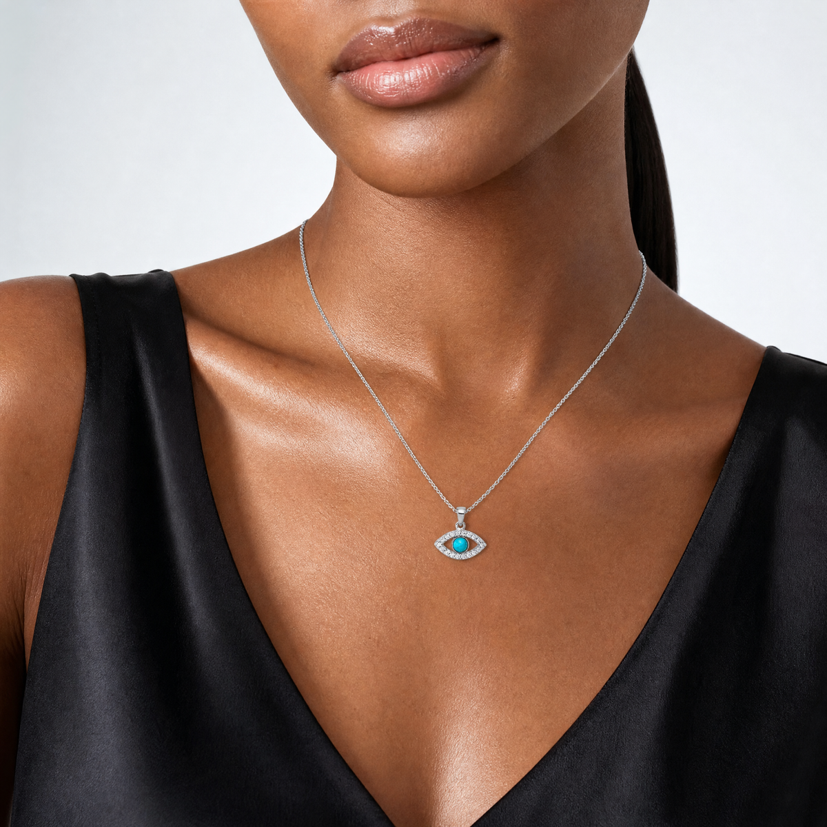 Sterling Silver RH-plated CZ and Compressed Turquoise Evil Eye Pendant - Model Shot