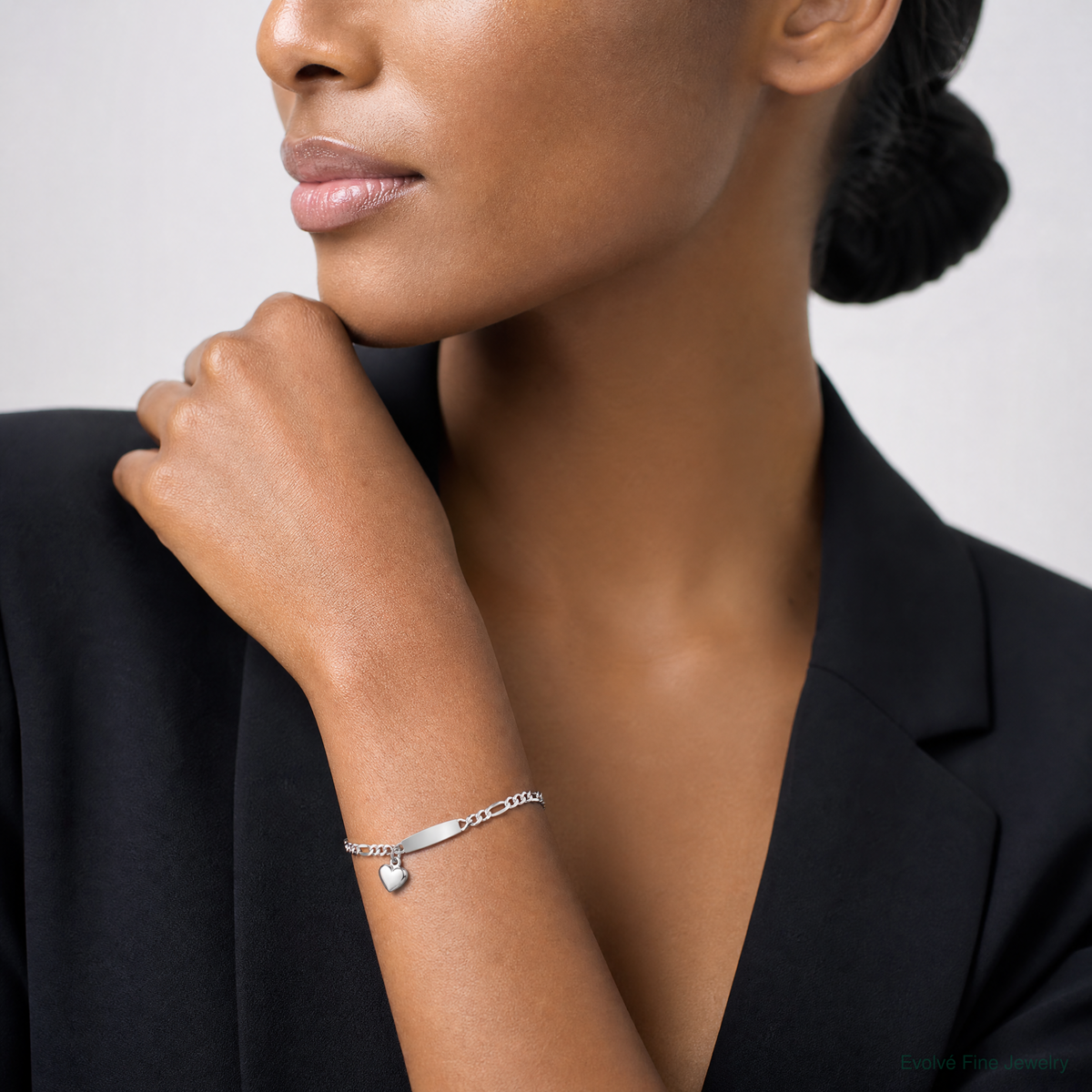 Sterling Silver Polished Figaro ID Heart Dangle Bracelet - Model Shot