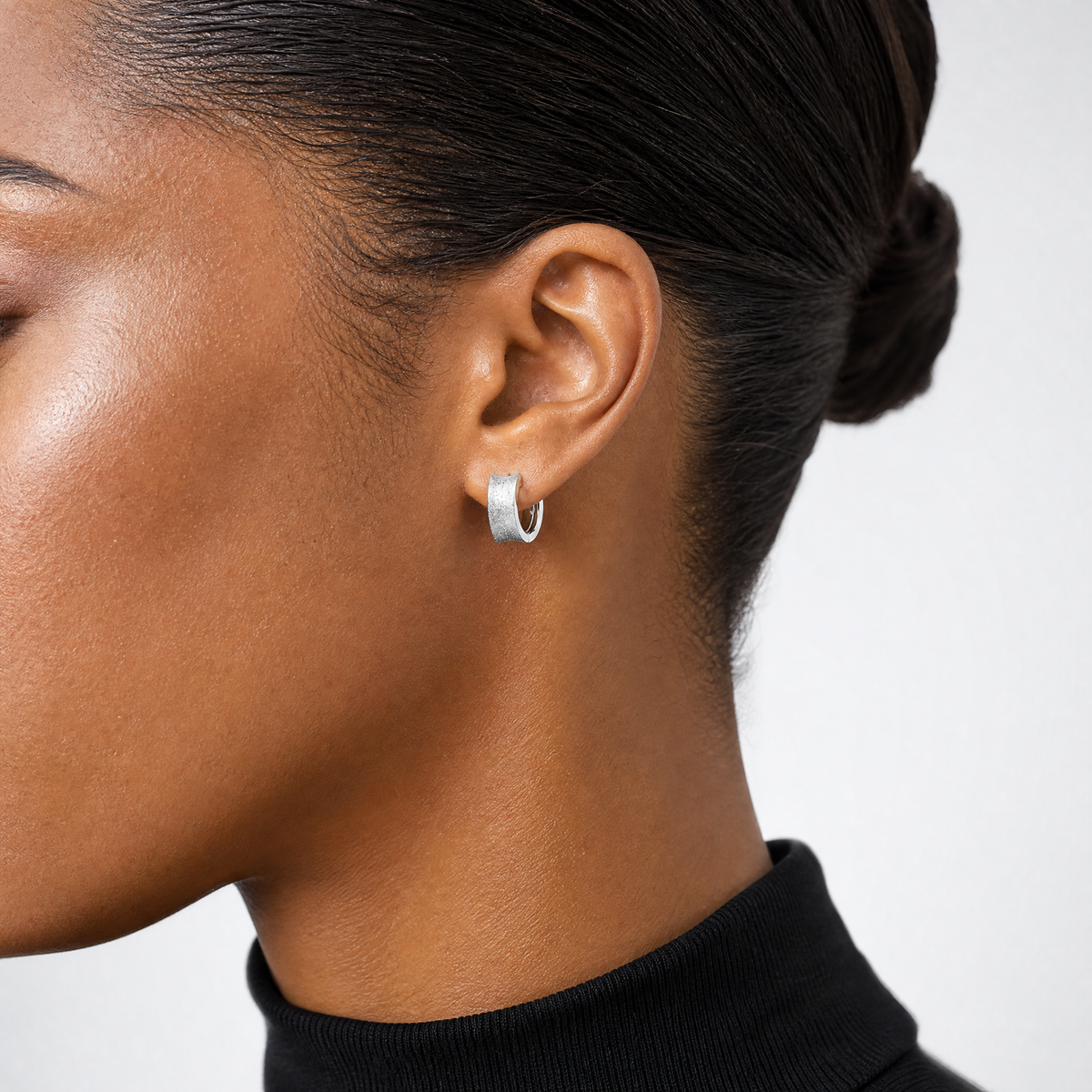 Leslie's Sterling Silver Rhod-plated D/C Brushed Huggie Hoop Earrings - Model Shot