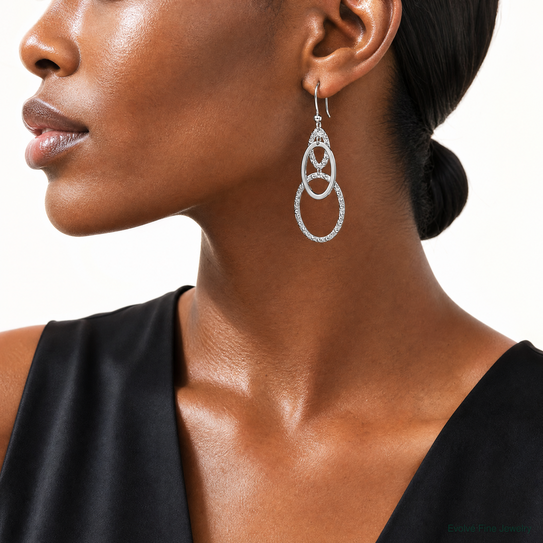 Leslie's Sterling Silver Rh-plated Polished/Textured Ovals Dangle Earrings - Model Shot